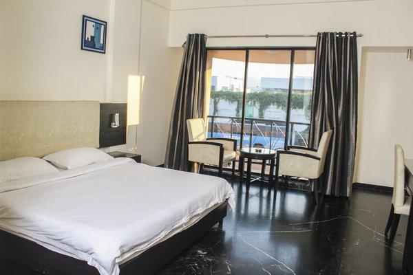 Hotel Aristro Lonavala Ruang foto