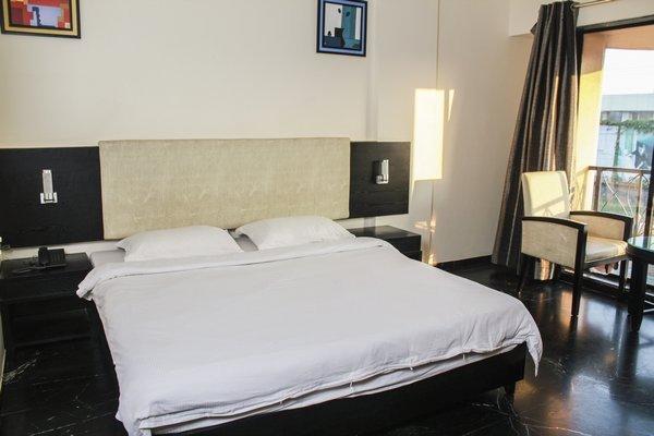 Hotel Aristro Lonavala Ruang foto